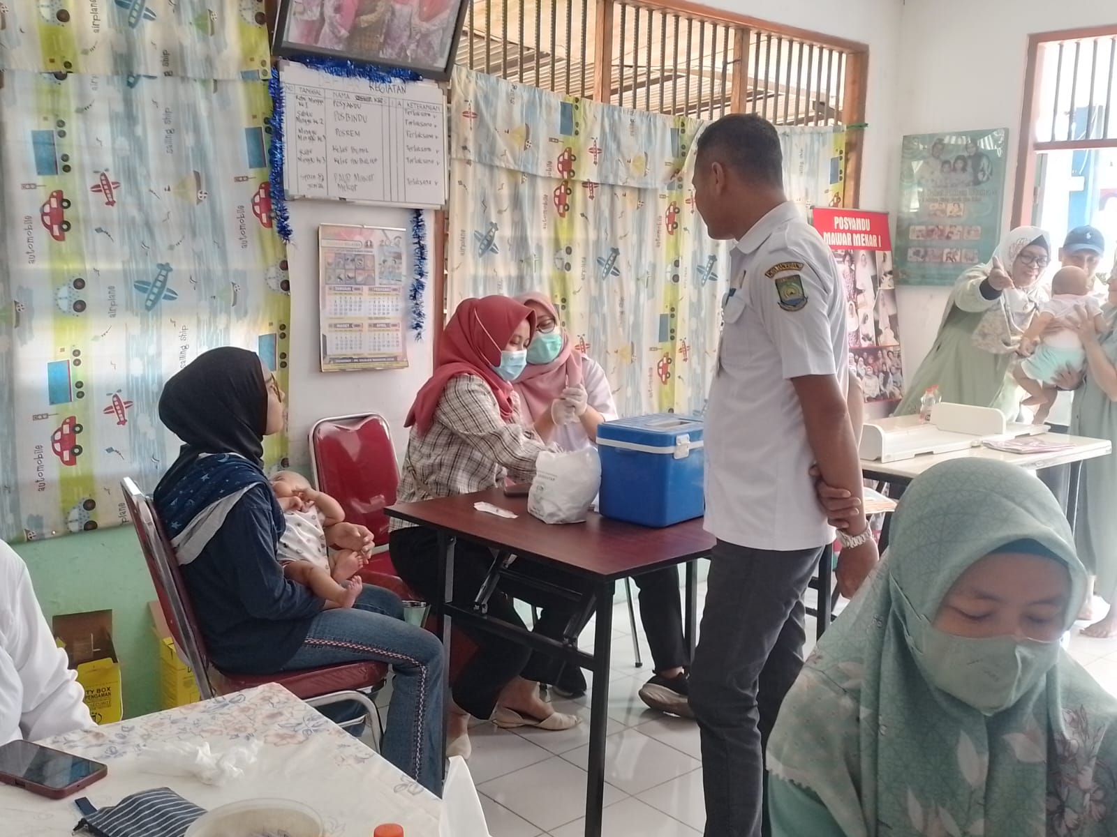 Monitoring Kegiatan Posyandu Mawar Mekar 1 dan 2 . Di RW. 02 Kel. Keroncong